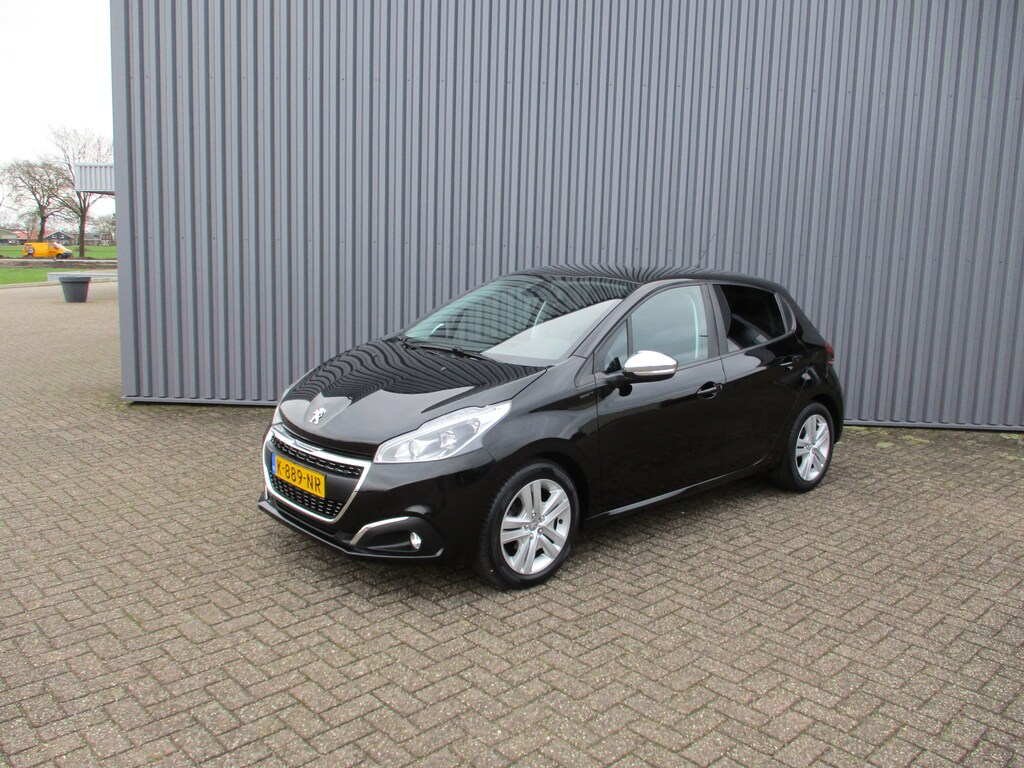 Peugeot 208 1.2 PureTech Signature Navi Airco Camera Led