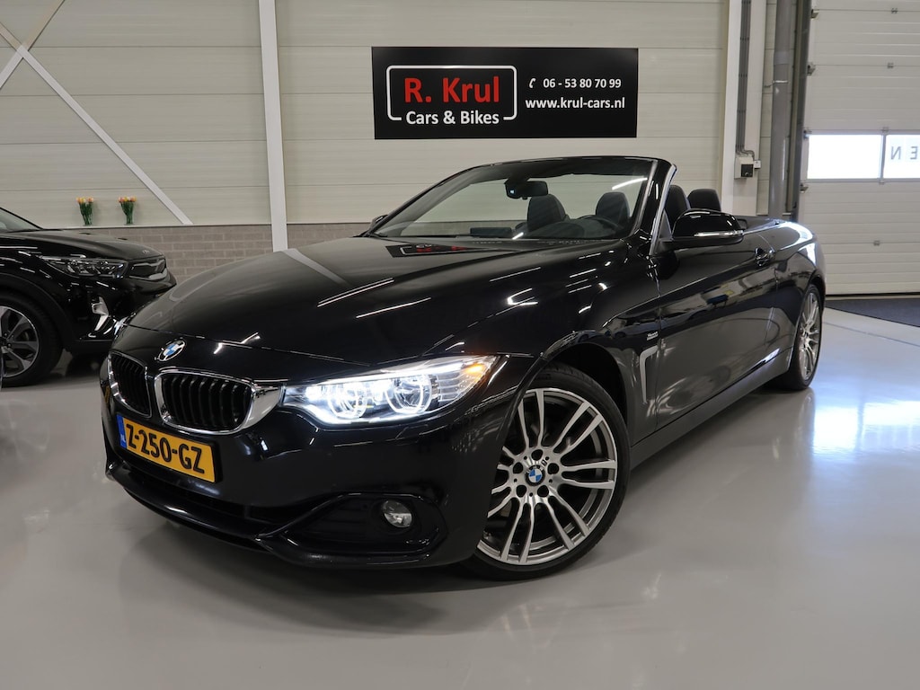 BMW 4-Serie Cabrio 430i High Executive Sport 252pk Zwart Leer Navigatie Bluetooth Nekverwarming Stoelverwarming Head-up display Sportvelgen Stuurverwarming Sportstoelen PDC Boekjes nette staat Airco-ecc