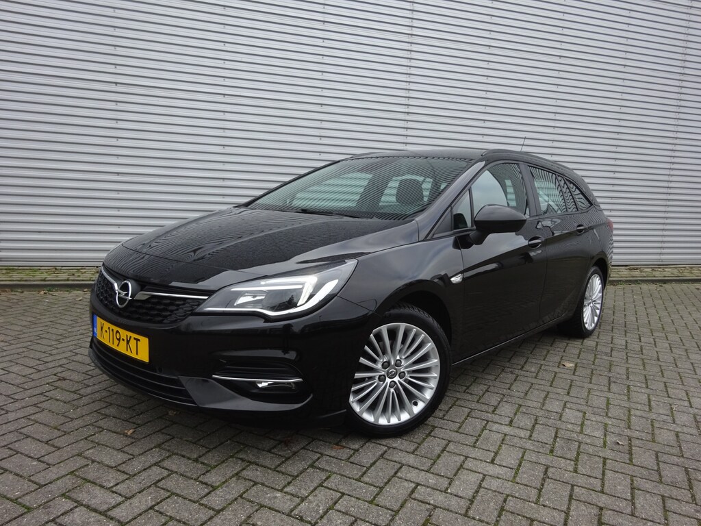 Opel Astra Sports Tourer 1.2 Business Edition 1e Eigenaar - Airco / Navi / Cruise / Parkeers. / Trekhaak /  Lm velgen / NAP