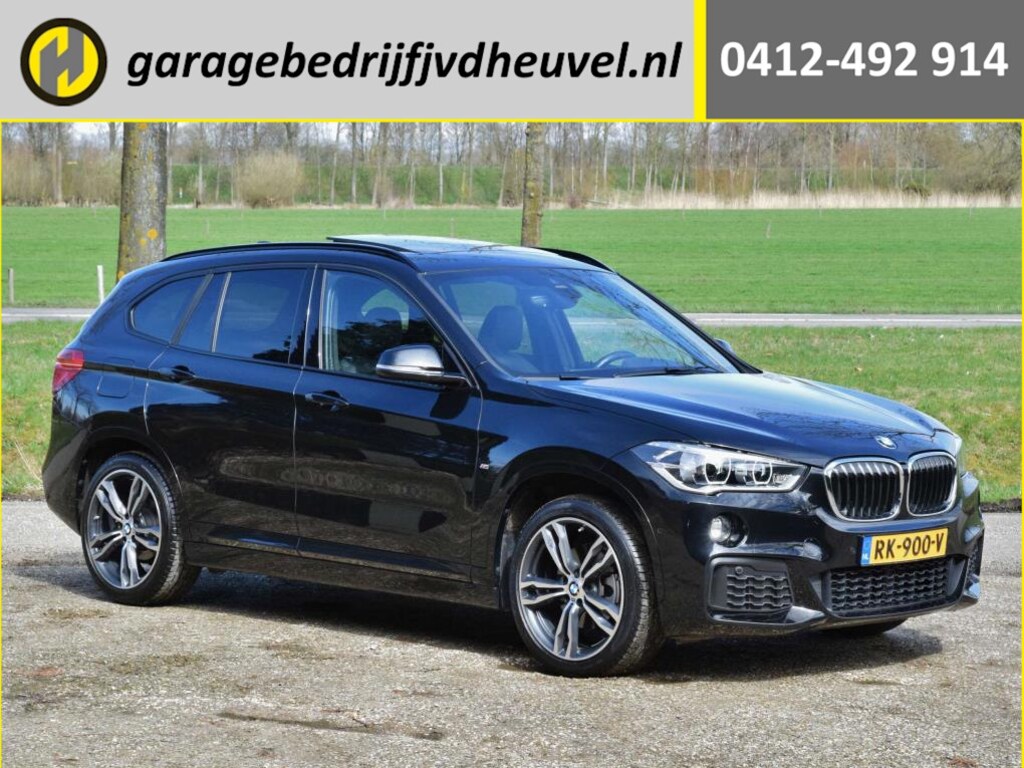 BMW X1 18d sDrive High Executive / head-up display / panoramadak / camera achter / zwart leer