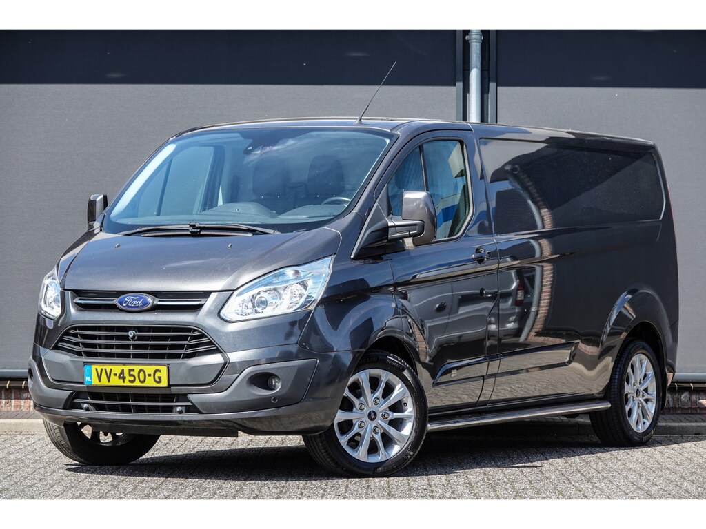 Ford Transit Custom L2H1 2.2Tdci 125Pk | Anniversary Edition | Stoel-Bank | Achteruitrijcamera | Trekhaak | Side-Bars | 18'' | Magnetic Grey