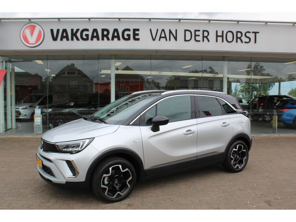 Opel Crossland 1.2-110pk Turbo 'Elegance'. Mooie en luxe hoogzitter met weinig km's ! Volautm. airco dual, cruise control, camera, comfortstoelen, metallic lak, LM wielen, navigatie, telefoonvoorb., lane- en side assist, parkeersensoren v+a, LED verlichting etc.