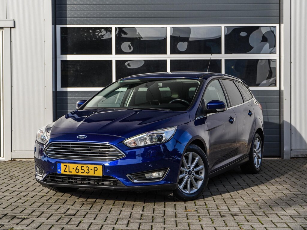 Ford Focus Wagon 1.0 Titanium Edition | Xenon | Keyless | Navi | Camera | Stoel+stuurverwarming | Cruise control | PDC v+a
