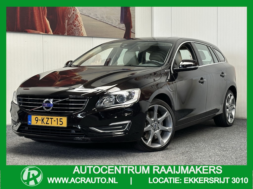 Volvo V60 2.4 D6 AWD PLUG- IN HYBRID SUMMUM NAVIGATIE CRUISE CONTROL CLIMATE CONTROL  LEDER STOELVERWARMING BLUETOOTH TELEFOON MULTIMEDIA VOORBEREIDING KEYLESS GO PDC AFN. TREKHAAK ZEER MOOI !!