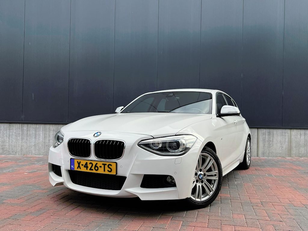 BMW 1-Serie 125i M-Sport * Navi * Cruise * Led * Trekhaak *