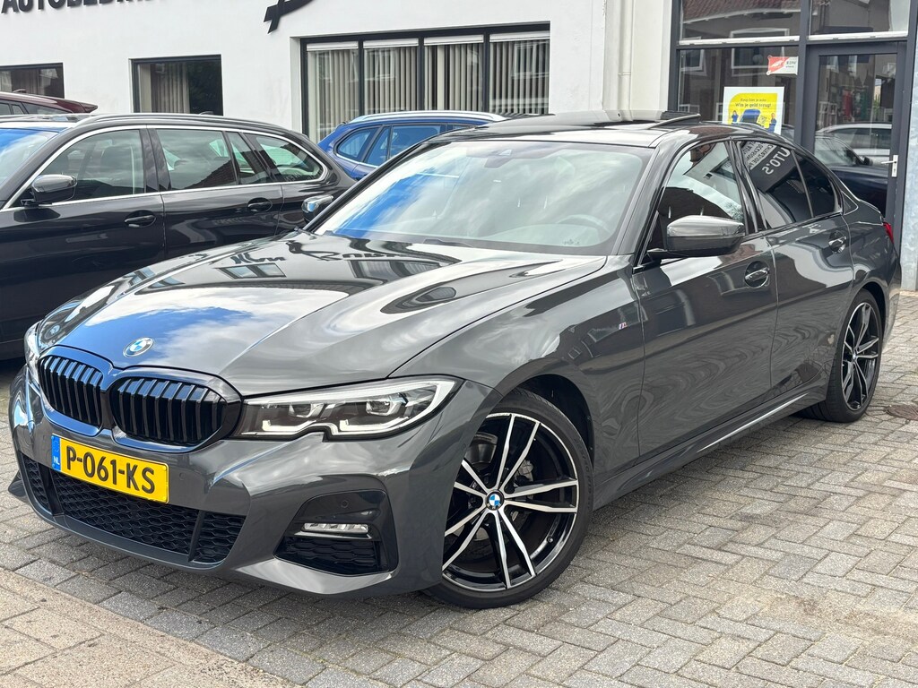 BMW 3-Serie 318i Business Edition, M-Sport, Schuifkanteldak, Individual kleur, Sportstoelen, Stoelverwarming,