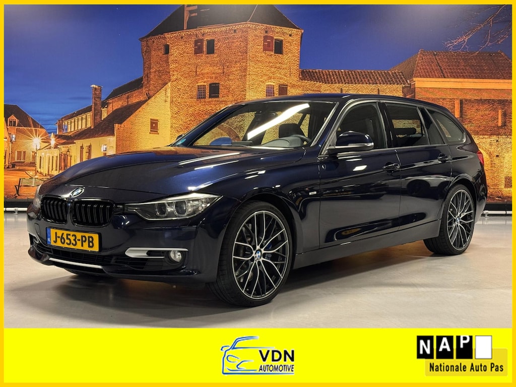 BMW 3-Serie Touring 335i xDrive High Exe Aut Leer Camera Xenon
