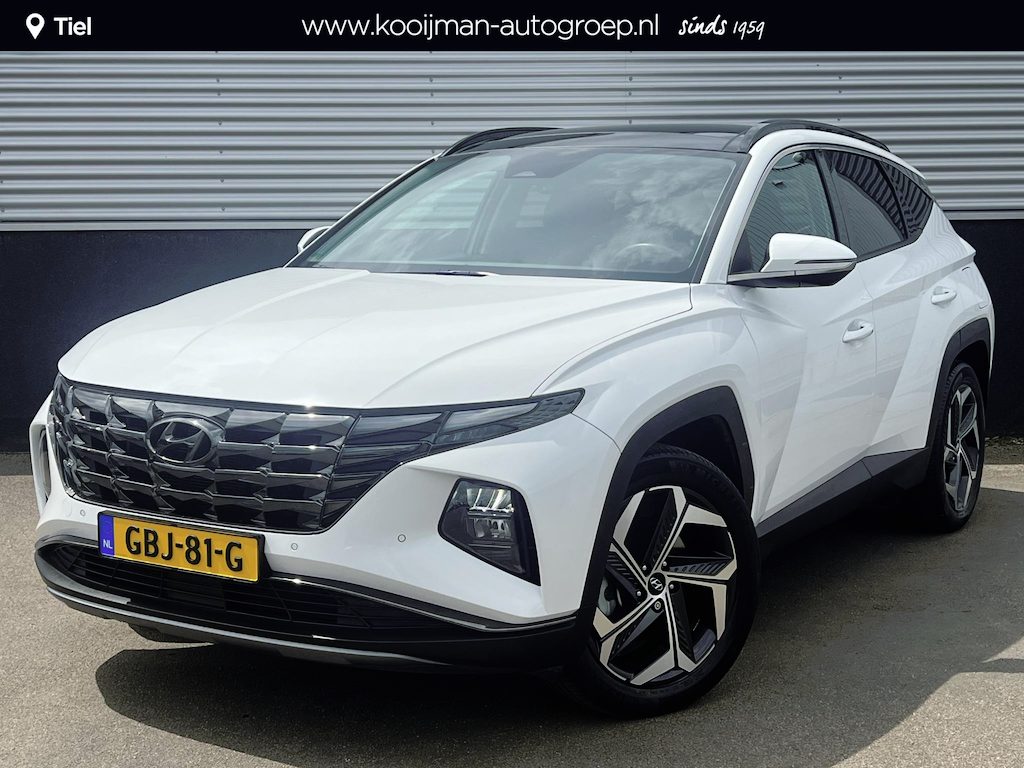 Hyundai Tucson 1.6 T-GDI PHEV Premium Edition Sky 4WD 4WD Schuif/kanteldak, Navigatie, Stoelverwarming, Parkeersensoren voor + Achter, Dodehoekdetectie, Climate control, BTW-Auto