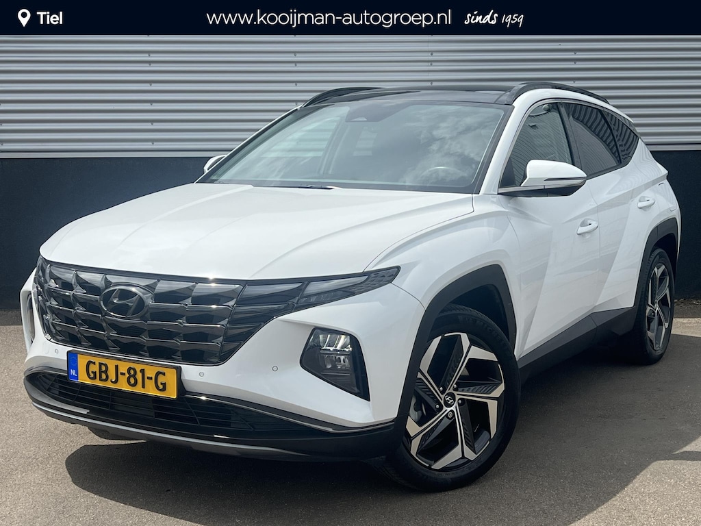 Hyundai Tucson 1.6 T-GDI PHEV Premium Edition Sky 4WD 4WD Schuif/kanteldak, Navigatie, Stoelverwarming, Parkeersensoren voor + Achter, Dodehoekdetectie, Climate control, BTW-Auto