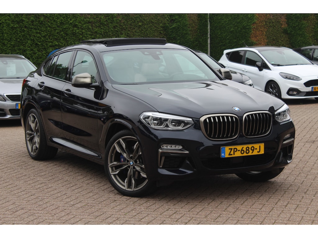 BMW X4 M40i High Exe. M Sport 73.952 km NL Auto. / Trekhaak / Panoramadak / Camera / Head-up / Luxe Leder / 21'' / Harman Kardon / Navigatie / Stuur+Stoelverwarming / DAB / Dodehoek / Cruise Control