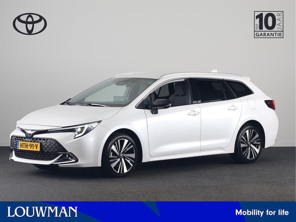 Toyota Corolla Touring Sports Hybrid 180 Business Plus | Parkeersensoren V+A | Half lederen bekleding | Parelmoer lak | Stoelverwarming | *