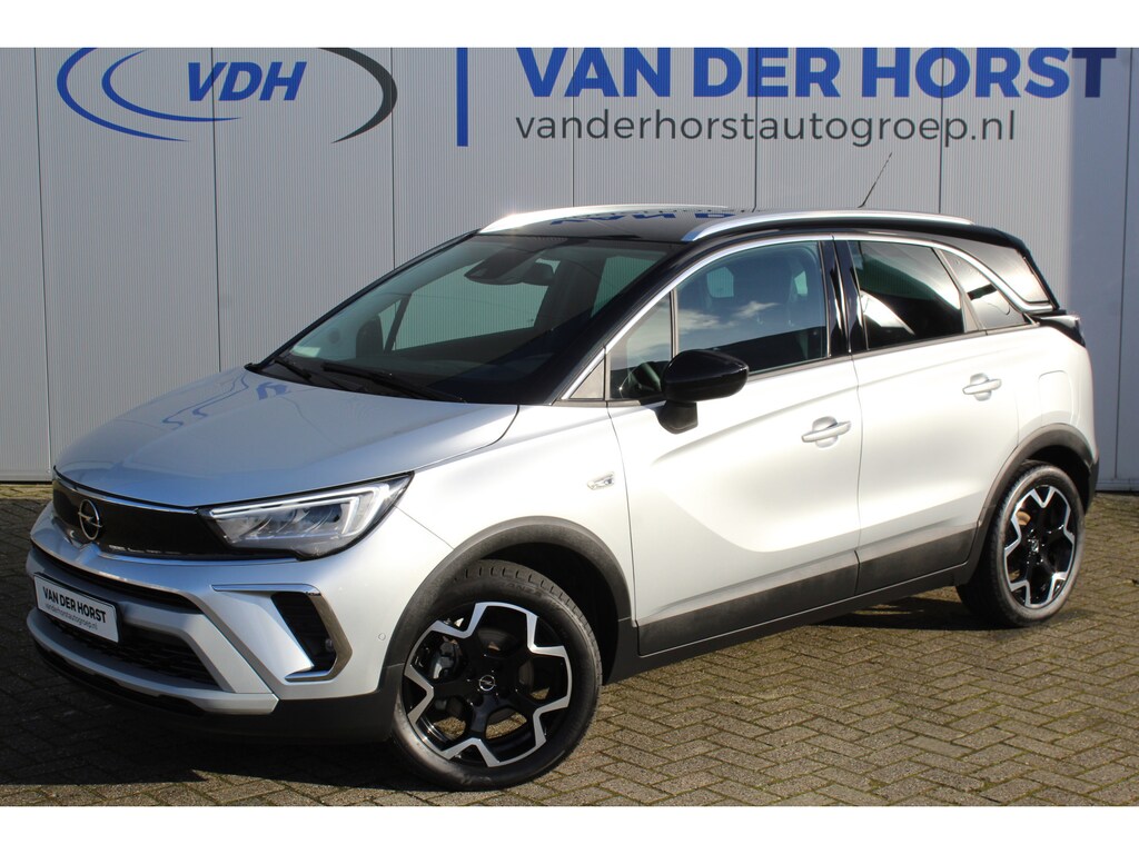 Opel Crossland 1.2-110pk Turbo 'Elegance'. Mooie en luxe hoogzitter met weinig km's ! Volautm. airco dual, cruise control, camera, comfortstoelen, metallic lak, LM wielen, navigatie, telefoonvoorb., lane- en side assist, parkeersensoren v+a, LED verlichting etc.