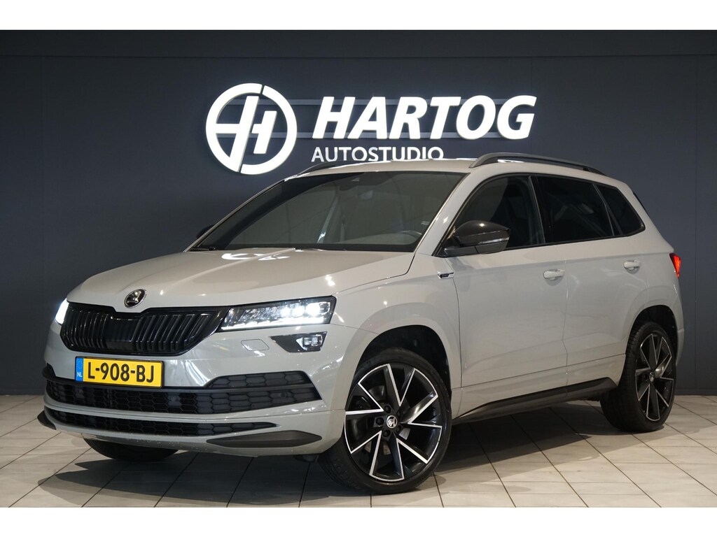 Skoda Karoq 1.5 TSI ACT Sportline Business *EERSTE EIGENAAR* + KEYLESS / CAMERA / CANTON AUDIO / TREKHAAK