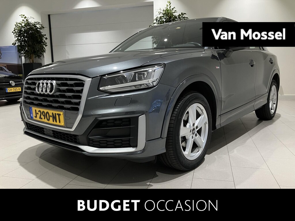 Audi Q2 35 TFSI S Edition 150 PK Airco | Automaat | S-Line Edition | Trekhaak | Elektrische Achterklep | Navigatie | Parkeersensoren Achter | Sportstuur | LED Verlichting | Cruise Control | Bluetooth | Lederen Stuurwiel | Lederen/Stof Bekleding | Lichtmetalen Velgen | Multimedia-Voorbereiding | Naviagtie | Parkeersensor Achter | Sportstoelen | Stuurwiel Multifunctioneel