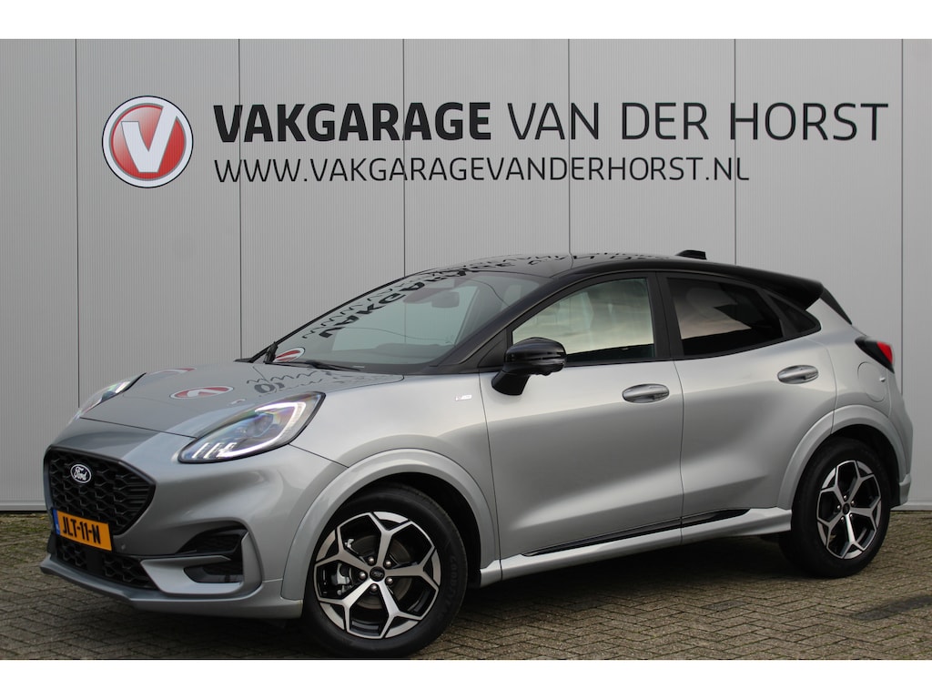 Ford Puma 1.0-125pk EcoBoost Mild-Hybrid ST-Line, two-tone. Alwéér een prachtige hoogzitter met slechts 9.400km ! Autm. airco, camera 360gr., LM wln, side- en lane assist, adaptieve cruise cntrl, navigatie, telefoonvoorb., stoel-, stuur-- en voorraamverw. etc.