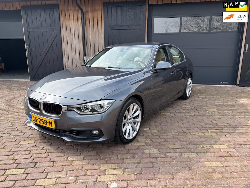 BMW 3-Serie 330e,HYBRIDE, LEER ,NAVI ,TREKHAAK, DUBBELSET WIELEN MET NW WINTERBANDEN.
