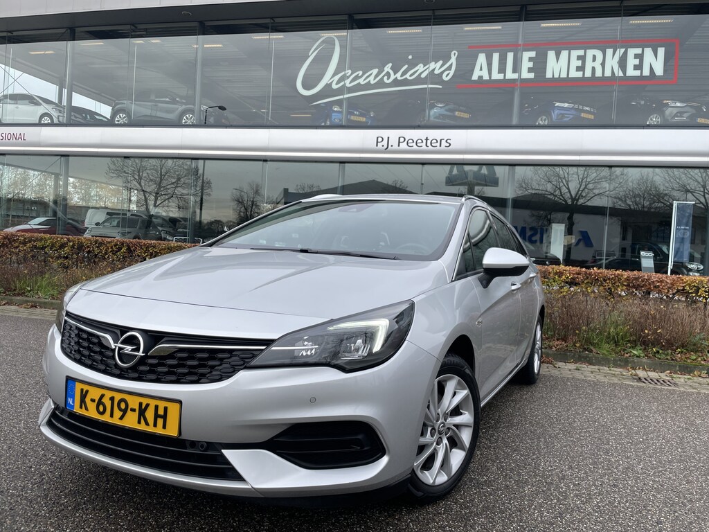 Opel Astra Sports Tourer 1.2 Business Elegance Airco - Cruise control - Parkeersensoren voor en achter - Achteruitrijcamera - Navigatie - Bluetooth - Keyless start and entry - Start/stop systeem - Stuur leder - Stuur multifunctioneel