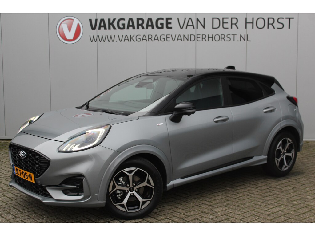 Ford Puma 1.0-125pk EcoBoost Mild-Hybrid ST-Line, two-tone. Alwéér een prachtige hoogzitter met slechts 12.000km ! Autm. airco, camera 360gr., LM wln, side- en lane assist, adaptieve cruise cntrl, navigatie, telefoonvoorb., stoel-, stuur-- en voorraamverw. etc.
