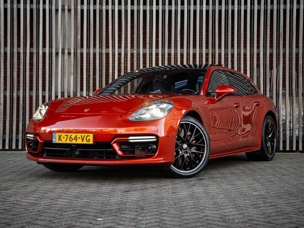 Porsche Panamera Sport Turismo 4.0 V8 Turbo S E-Hybrid 700pk |BTW|NL-AUTO|1e EIG.|Panorama|Keramisch|VOL OPTIES|Papaya Orange|