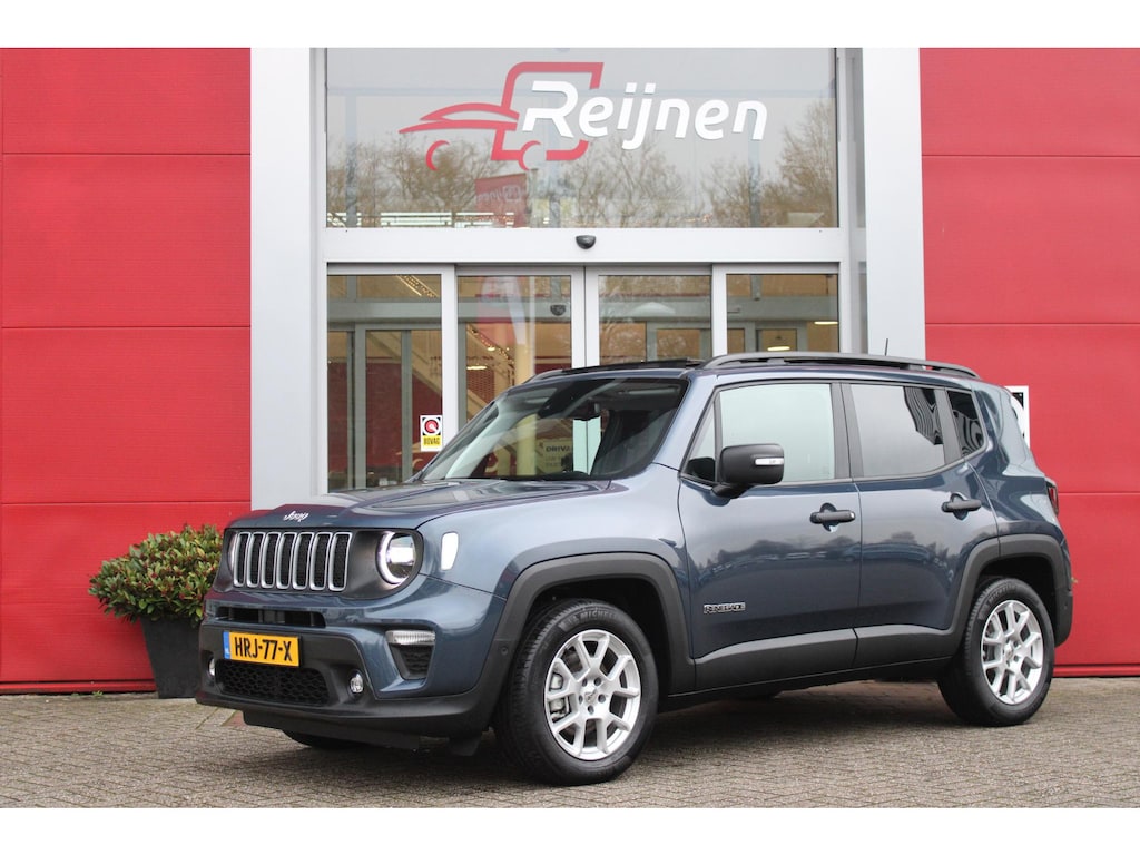 Jeep Renegade 1.5T 140PK e-Hybrid | PANORAMISCH SCHUIF/KANTEL DAK | DRAADLOZE APPLE CARPLAY/ANDROID AUTO | FULL LED KOPLAMPEN | DODEHOEK DETECTIE | ADAPTIVE CRUISE CONTROL | LICHTMETALEN VELGEN 17" | ACHTERUITRIJ CAMERA | DAB+ RADIO | NAVIGATIE | PARKEERSENSOREN VOOR + ACHTER | AUTOMATISCH INPARKEREN | KEYLESS ENTRY/START | EXTRA GETINTE RUITEN ACHTER |