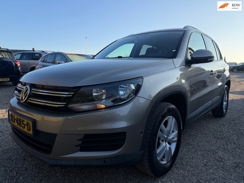 Volkswagen Tiguan 1.4 TSI Comfort&Design Edition Parkeer Assist geleverd met Nieuwe Ketting