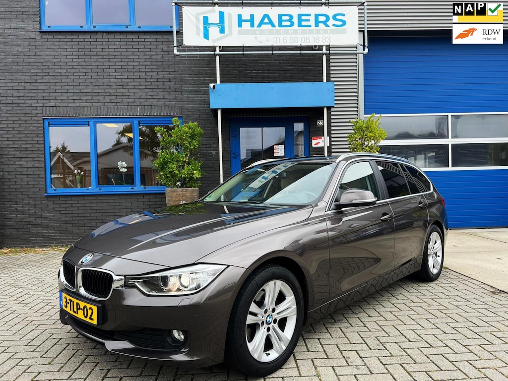 BMW 3-Serie Touring 316i High Executive 136PK|Origineel NL|Prof Navi|Automaat|Leder|Trekhaak|StoelVW|Xenon|Climate|Isofix|Camera