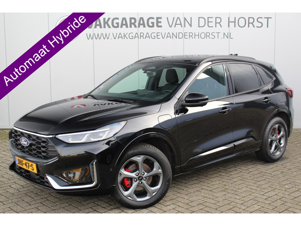 Ford Kuga 2.5-243pk PHEV ST-Line X. Trekgewicht 2.100kg. Nieuw Model ! Van €. 54.937,- voor €. 39.950,- Trekgewicht van 2.100kg ! Elektr. panodak., elektr. trekhaak, stoel-, stuur- en voorraamverw., 360gr. Camera, HUD, AppleCarplay/Androidauto, Elektr. verstelb. comfortstoelen, LED verl.