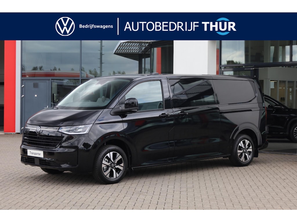 Volkswagen Transporter 2.5 eHybrid L2H1 30 Bulli 233PK / 171kW Rondomzicht camera, zijschuifdeur links + rechts met sluithulp, verwarmbare en elektrisch verstelbare ergonomische voorstoelen, Apple Carplay & Android Auto, achteruitrijcamera, dodehoekdetectie (Side Assist), verwarmbaar stuurwiel, elektrisch uitklapbare trekhaak, volledig digitaal instrumentenpaneel (Digital Cockpit), kunstlederen interieurdelen, draadloos telefoon laden, grootlichtassistent, 17'' LMV 'Monte Carlo'