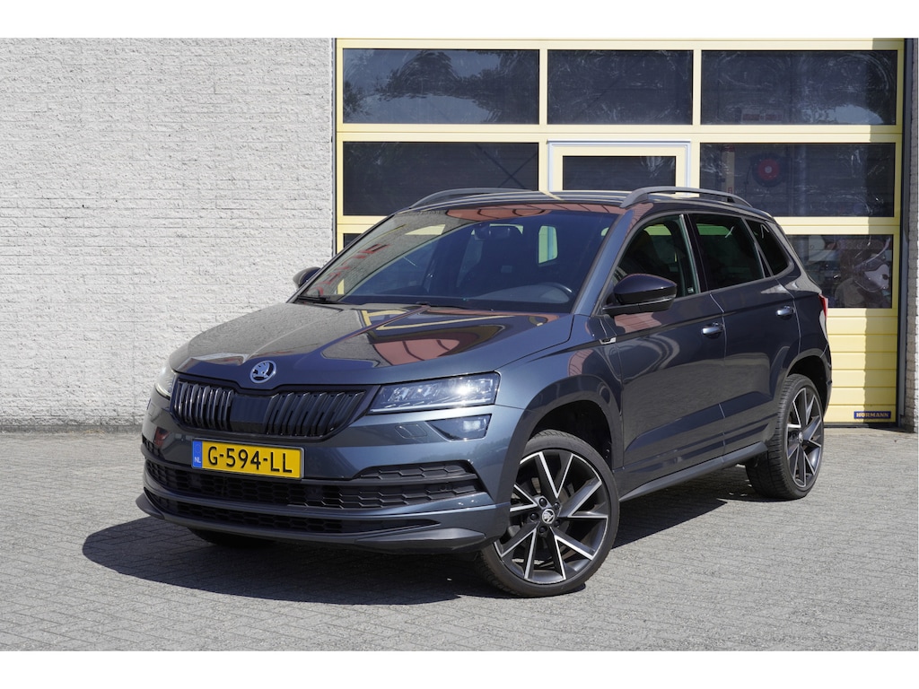 Skoda Karoq 1.5 TSI ACT 150PK! Automaat Sportline Business BJ2019 Lmv 18" | Led | Pdc | Navi | App-Connect | Dashboard verlichting | Virtual cockpit | Climate control | Cruise control | Sportstoelen | Zwarte hemel | Sport stuurwiel | Extra getint glas