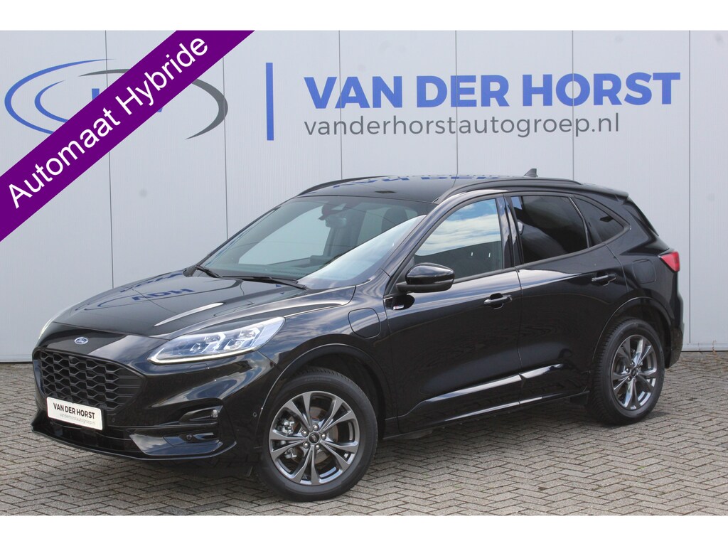 Ford Kuga 2.5-225pk Plug-in Hybrid ST-Line X. Hybride rijden voor een reële prijs ! Adaptive Cruise Control, Stoel- en voorraamverwarming, Climate Control, Metallic lak, Camera v+a, Elektr. achterklep, Side- en lane assist etc.