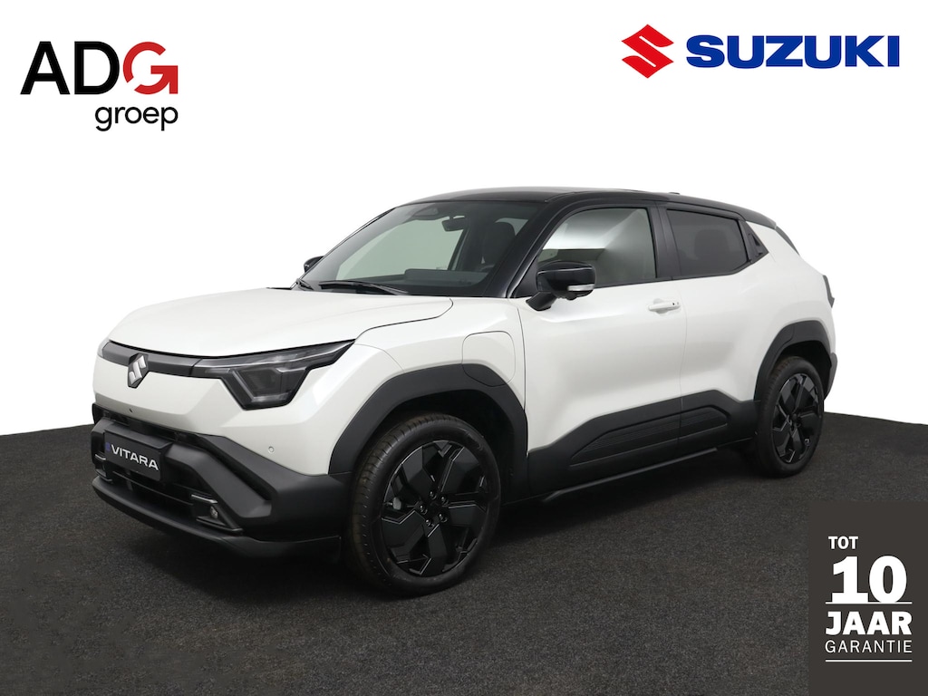 Suzuki e-Vitara | Climate control | Cruise control adaptive | Navigatie | Panoramadak | Apple carplay, android auto | Stuur en stoelverwarming | Warmtepomp | Infinity sound system | Elektrisch verstelbare stoel |