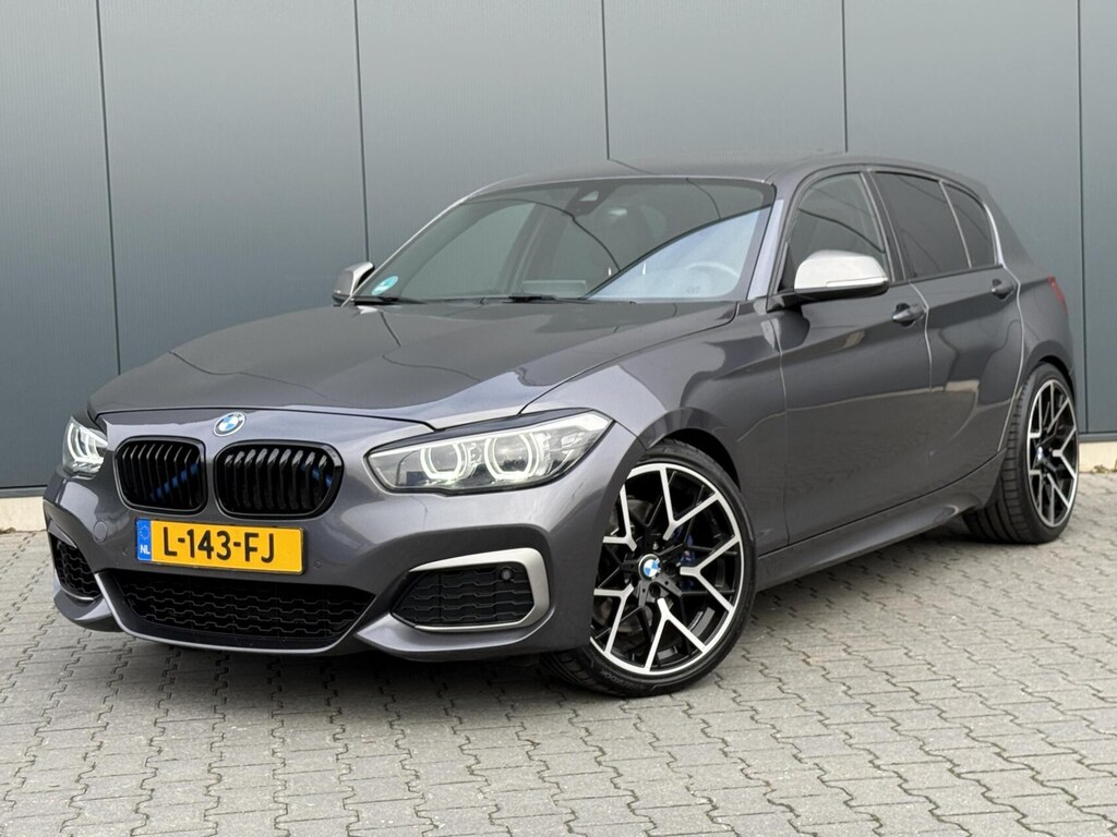 BMW 1-Serie M140i xDrive High Executive Oh Historie - Leder - Apple CarPlay