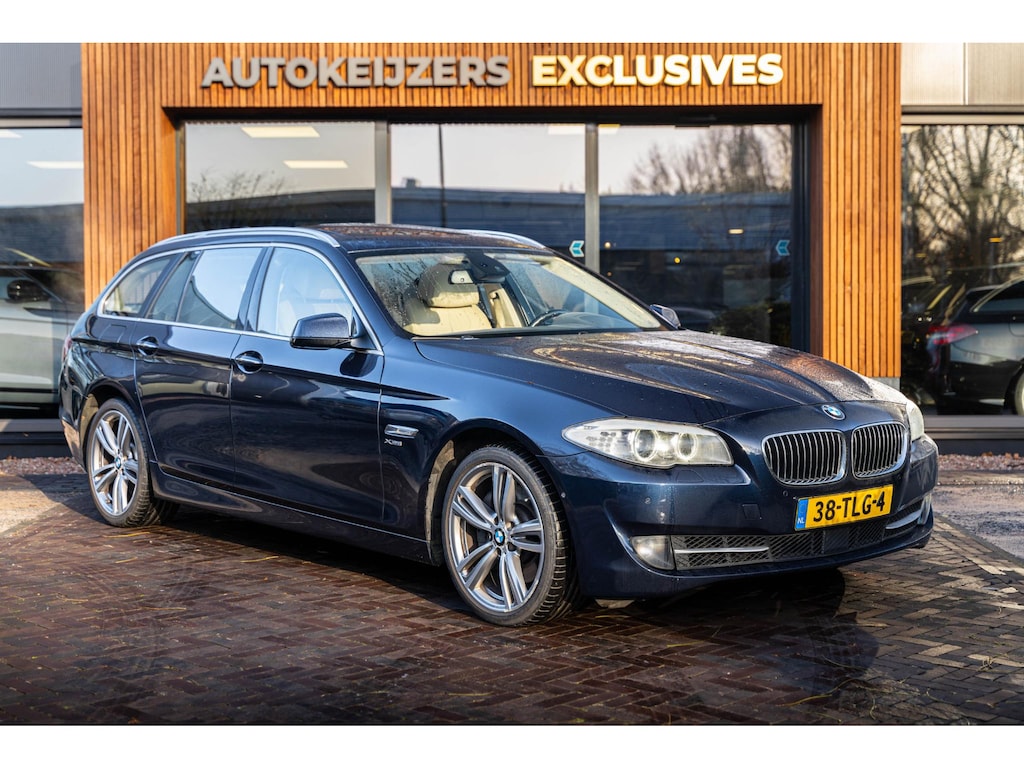 BMW 5-Serie Touring 528xi High Executive Panoramadak Leer