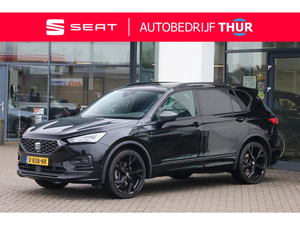 SEAT Tarraco 1.4 TSI e-Hybrid PHEV FR Business SOH 97,07% | 245PK / 180kW DSG, NL auto 1e eigenaar door ons nieuw geleverd en onderhouden, PPF folie neus, 21" LMV, rondomzichtcamera (area view), wegklapbare trekhaak, extra getinte ramen achter, panoramadak, voorstoelen verwarmbaar, stuurwiel verwarmbaar, dodehoekdetectie (side assist), keyless entry & go, elektrische achterklep, draadloos laden telefoon, navigatie, adaptieve cruise control (acc), Apple Carplay & Android Auto, elektrisch verstel-, verwarm- en inklapbare buitenspiegels