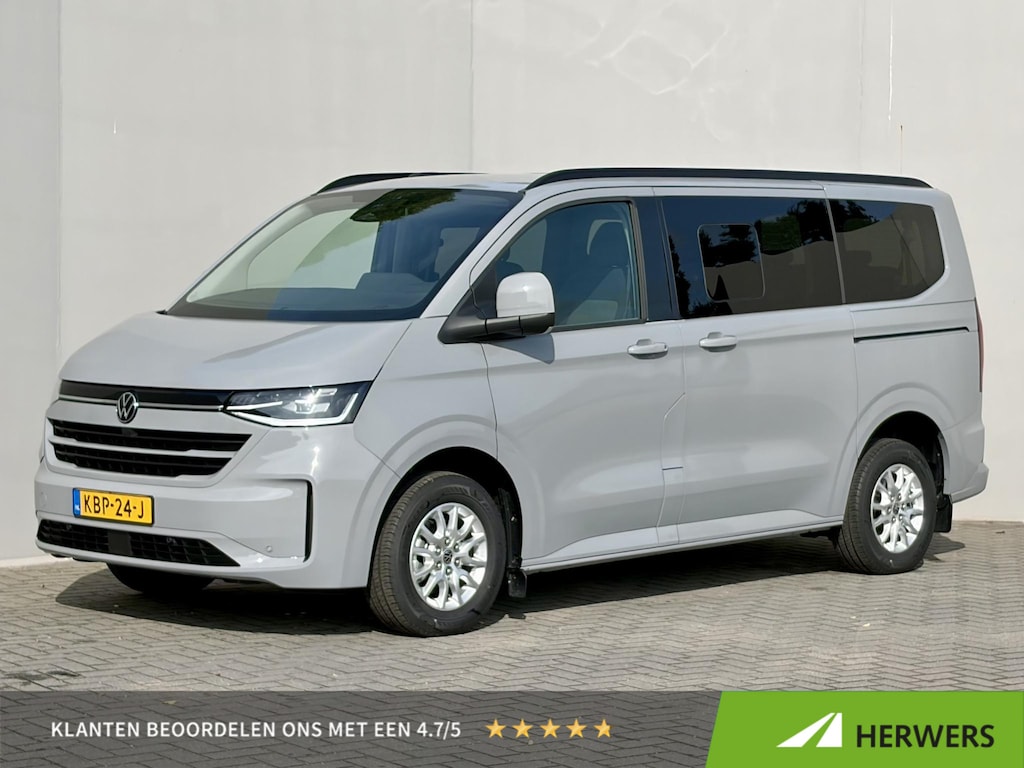 Volkswagen e-Transporter Caravelle 32 L1H1 Life 64 kWh Automaat 8 PERSOONS / garantie tot 12-2027 / WLTP 305 km / Stone Gray / Warmtepomp / Apple Carplay/Android Auto / Licht en zicht-pakket / Keyless entry / draadloze telefoonlader /