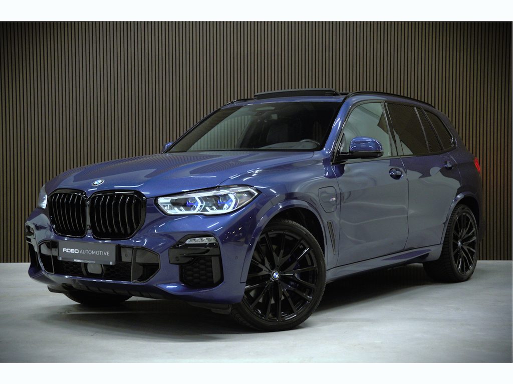 BMW X5 xDrive45e High Executive M Sport | Panoramadak | Harman Kardon | Luchtvering | Laser | Adaptive Cruise Control | Keyless | 360 Camera | Head-Up Display | Ambiance Verlichting | M Sport remmen | Memory Seats | Stoelverwarming