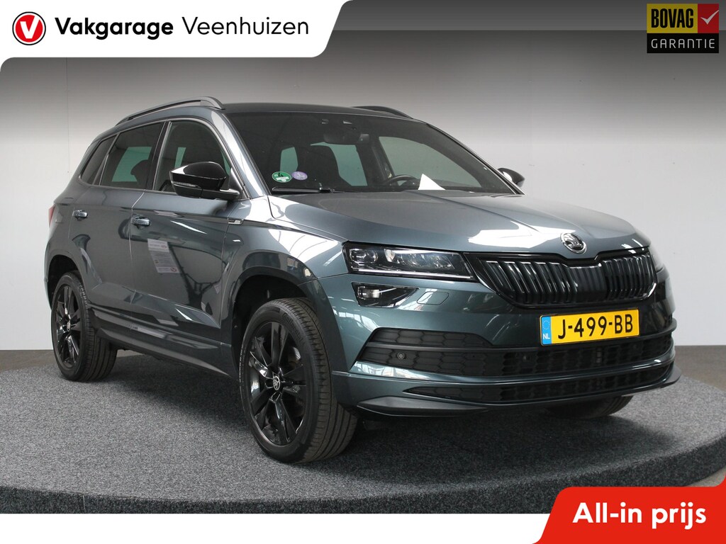 Skoda Karoq 1.5 TSI ACT Sportline Business|Rijklaar prijs|Elek. Trekhaak|Camera|Carplay|ACC|Stoel verw.|