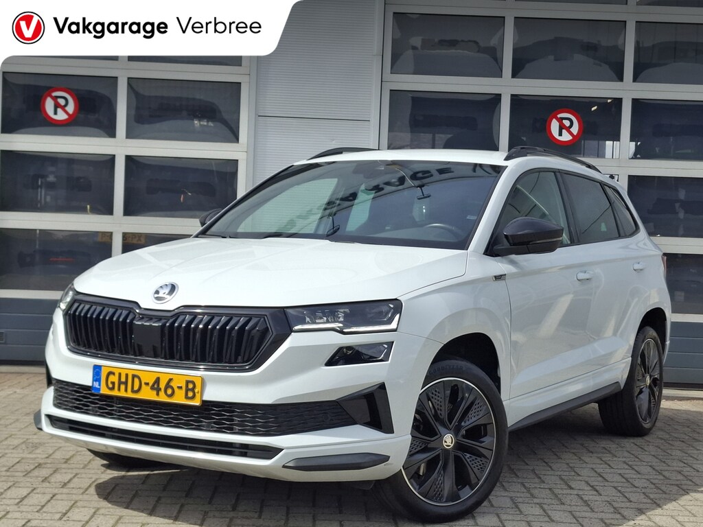 Skoda Karoq 1.5 TSI ACT Sportline Business | Android/Apple Carplay | Adaptive Cruise Control | LMV 18" | Achteruitrijcamera | PDC V+A | Elektrische kofferbak | Climate control