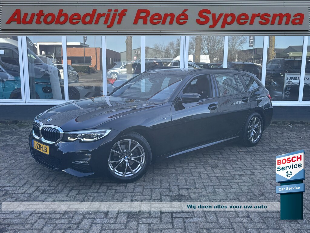 BMW 3-Serie Touring 318i Business Edition | M Pakket | Sfeerverlichting | Apple Carplay | Parkeercamera