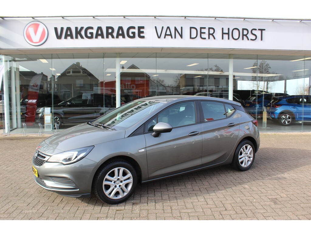Opel Astra 1.0 Turbo Online Edition 5deurs , zeer nette auto Climate control , Cruise control , Navigatie , Bluetooth Parkeersensoren achter en voor