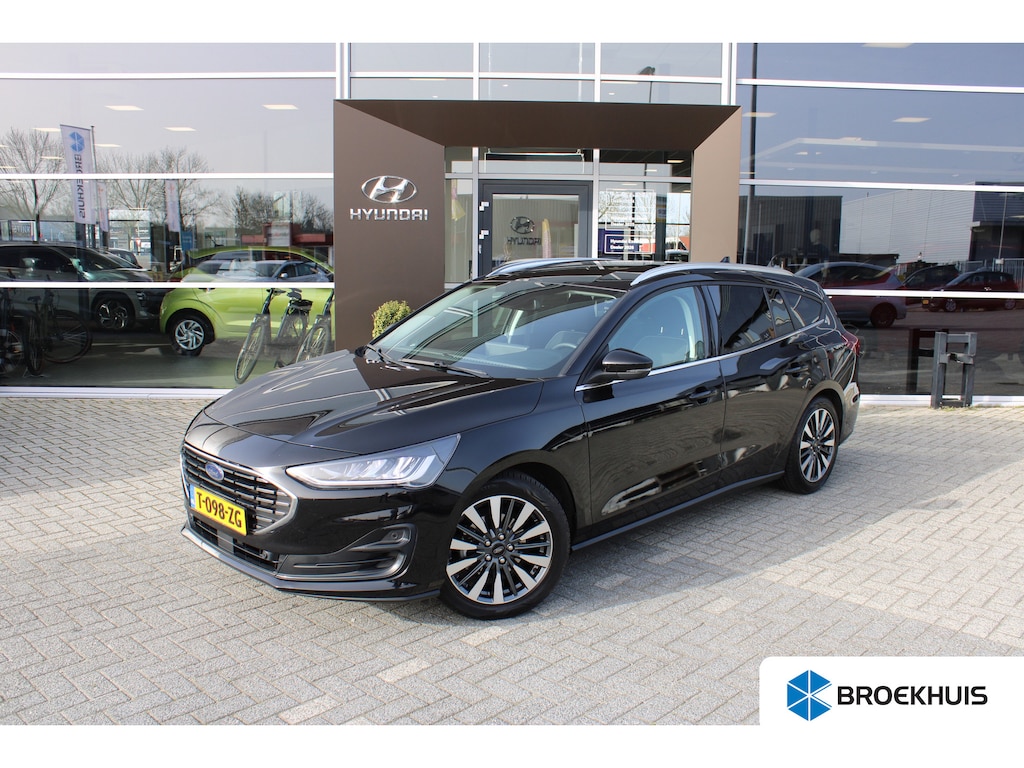 Ford Focus Wagon 1.0 EcoBoost Hybrid Titanium X | Achteruitrijcamera | Cruise Control | Voorstoelen Verwarmd | Verwarmde voorruit | Achteruitrijcamera | Airco (automatisch) | Alarm klasse 1(startblokkering)