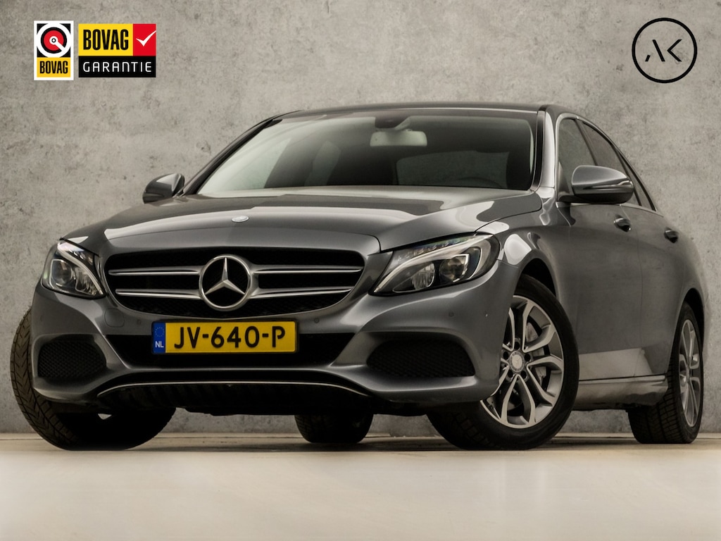 Mercedes-Benz C-klasse 350 e AMG Sport 279Pk Automaat (NAVIGATIE, LUCHTVERING, ORG. NL, GETINT GLAS, ELEK SPORTSTOELEN, LEDER, CRUISE, KEYLESS START, TREKHAAK, NIEUWSTAAT)