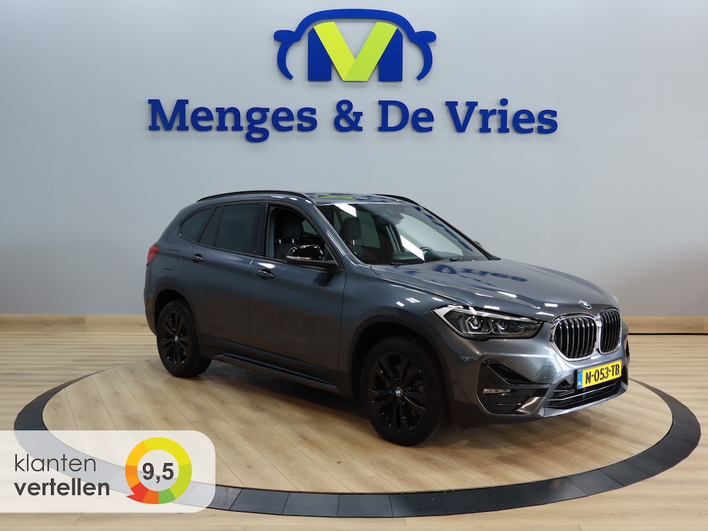 BMW X1 sDrive20i Business Edition Airco ECC | Head Up Display | Apple Carplay | Camera |  LED | Cruise Control | Isofix | NAP