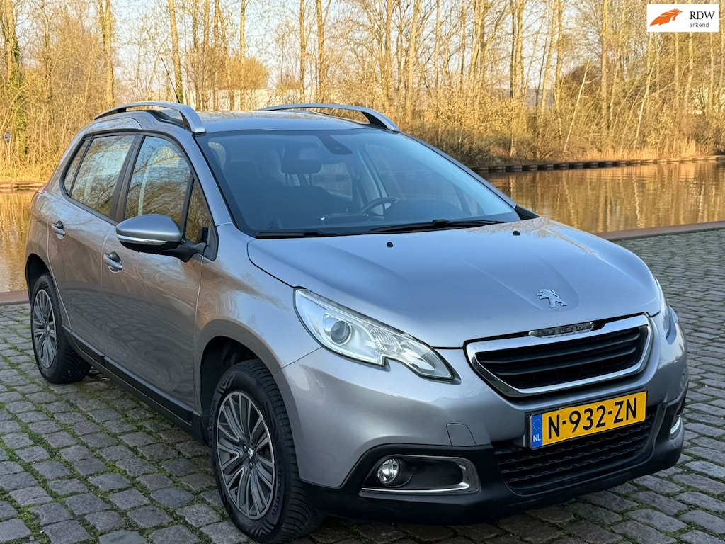 Peugeot 2008 1.2 PureTech Active 1e eigenaar dealer onderhouden airco cruis control navigatie parkeer