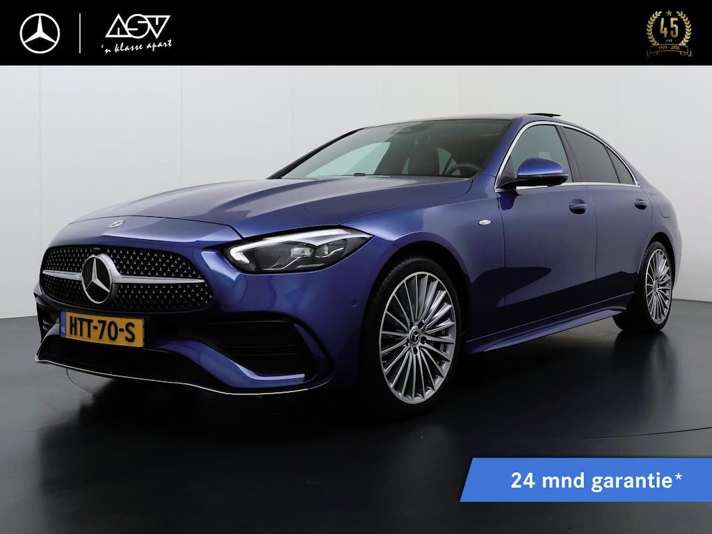 Mercedes-Benz C-klasse 300 e AMG Business Solution | Panorama - Schuifdak | Memory Seats | 360° Camera | 19" AMG Multispaaks Velgen | Sfeerverlichting | Distronic Cruise Control | Smartphone Integratie Pakket