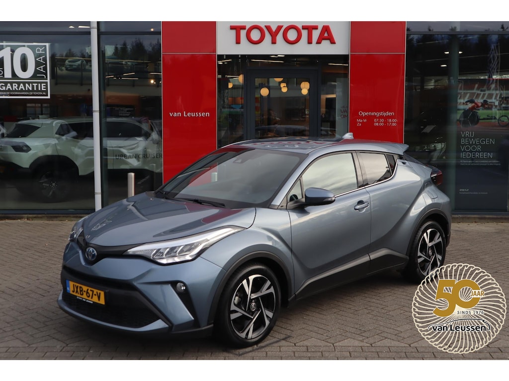 Toyota C-HR / C-HR+ 1.8 HYBRID STYLE APPLE/ANDROID STOELVERW. BLIND-SPOT NAVI AD-CRUISE HALF-LEDER 18"LM-VELGEN