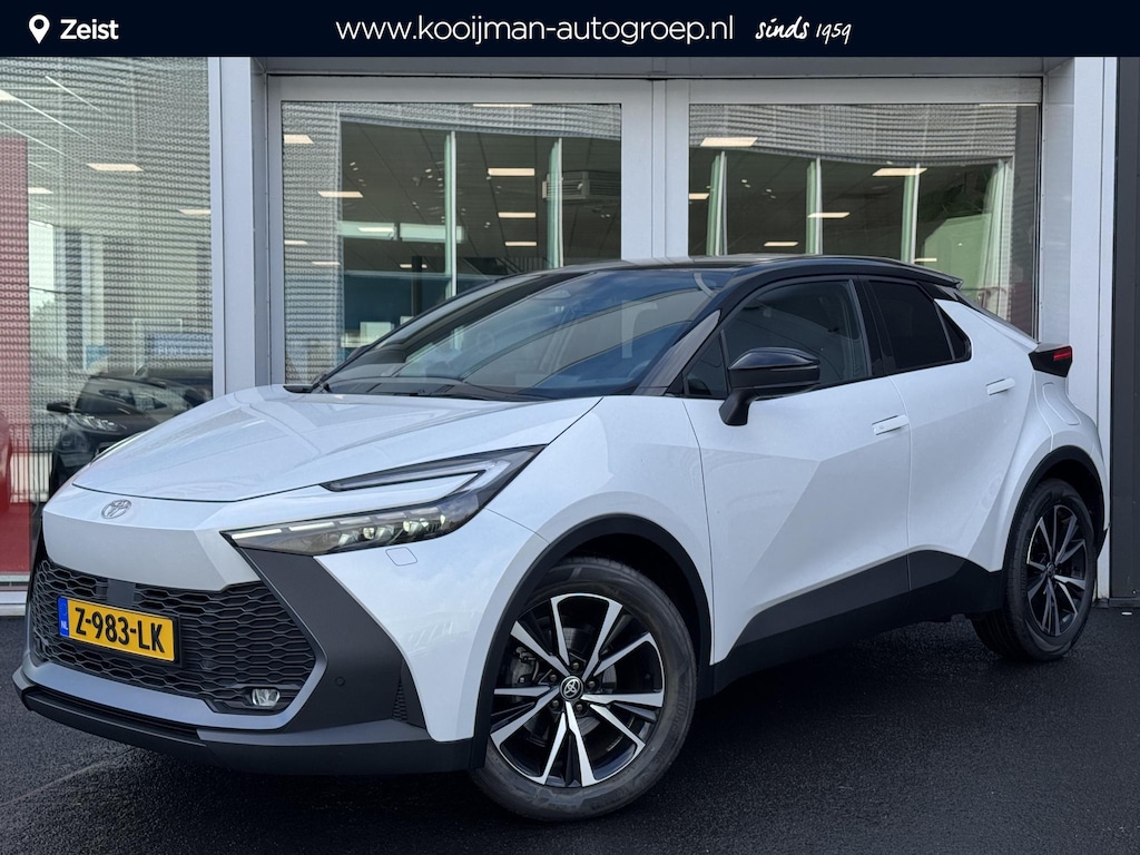 Toyota C-HR / C-HR+ 1.8 Hybrid 140 Style Bi-Tone | Unieke tellerstand!! | Dodehoeksensor | Stoelverwarming | Voorruitverwarming | Navigatie | Achteruitrijcamera