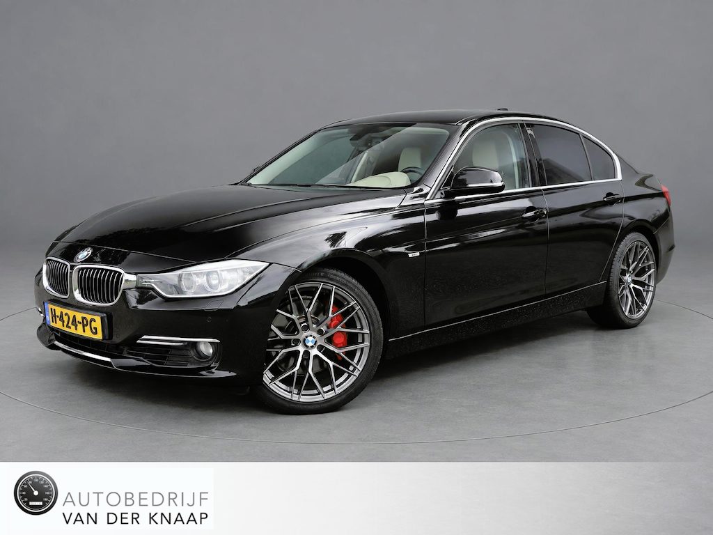 BMW 3-Serie 335i | Clima | Cruise | Multimedia/Navi | Memory | Stoelverwarming | Leder | PDC + Camera |