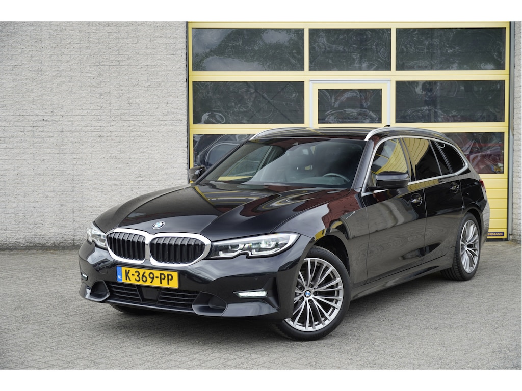 BMW 3-Serie Touring 318i Automaat! High Executive Edition BJ2021 Lmv 18" | Led V+A | Pdc | Elek. achterklep | Navi | Virtual cockpit | Dashboard verlichting | Climate control | Cruise control | Lederen bekleding | Sportstoelen | Verwarmde voorstoelen | Zwarte hemel
