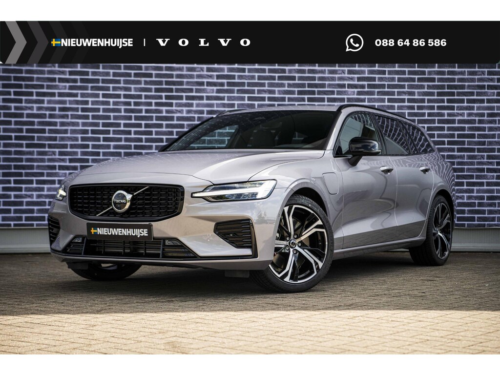 Volvo V60 T6 Plug-in hybrid AWD Ultra Dark | Google | Long Range | Head-Up Display | Getint Glas | DAB | Harman Kardon Audio | Stoelverwarming Voor + Achter | Schuif-/Kanteldak | 360 Camera | Adaptieve Cruise Control | Zwarte Hemelbekleding | 19" LM